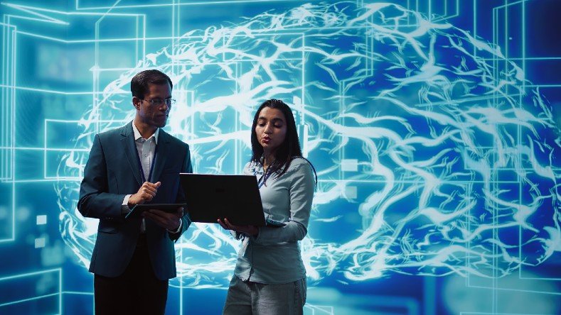 A representation of AI behind two businesspeople.