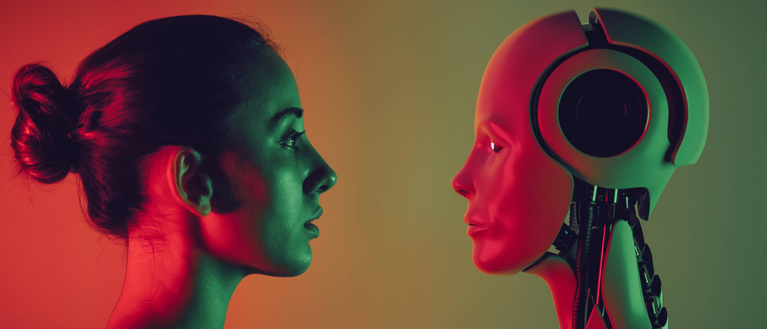 A woman and a robot stare each other down.