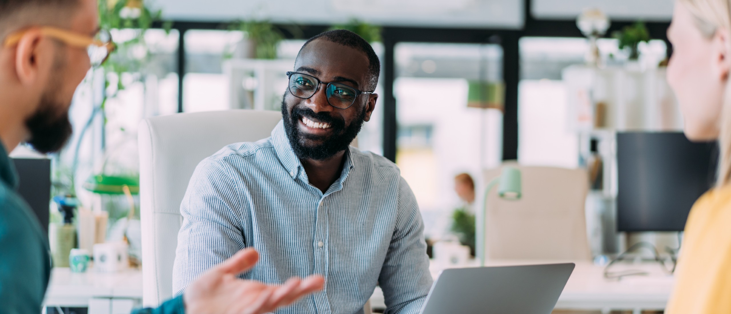 A group discusses their website