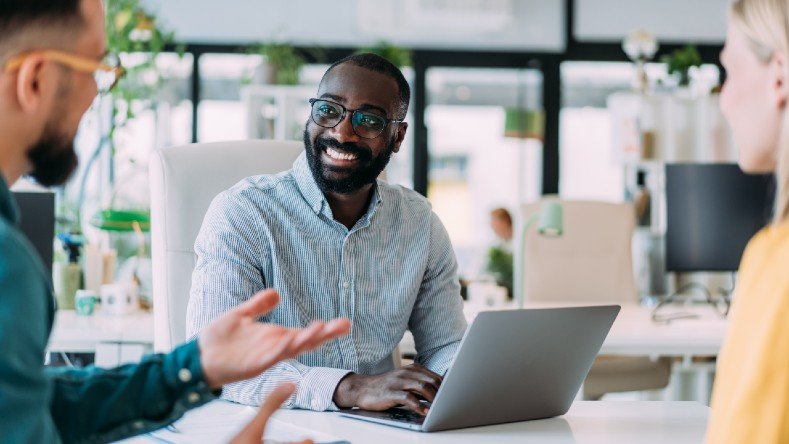 A group discusses their website