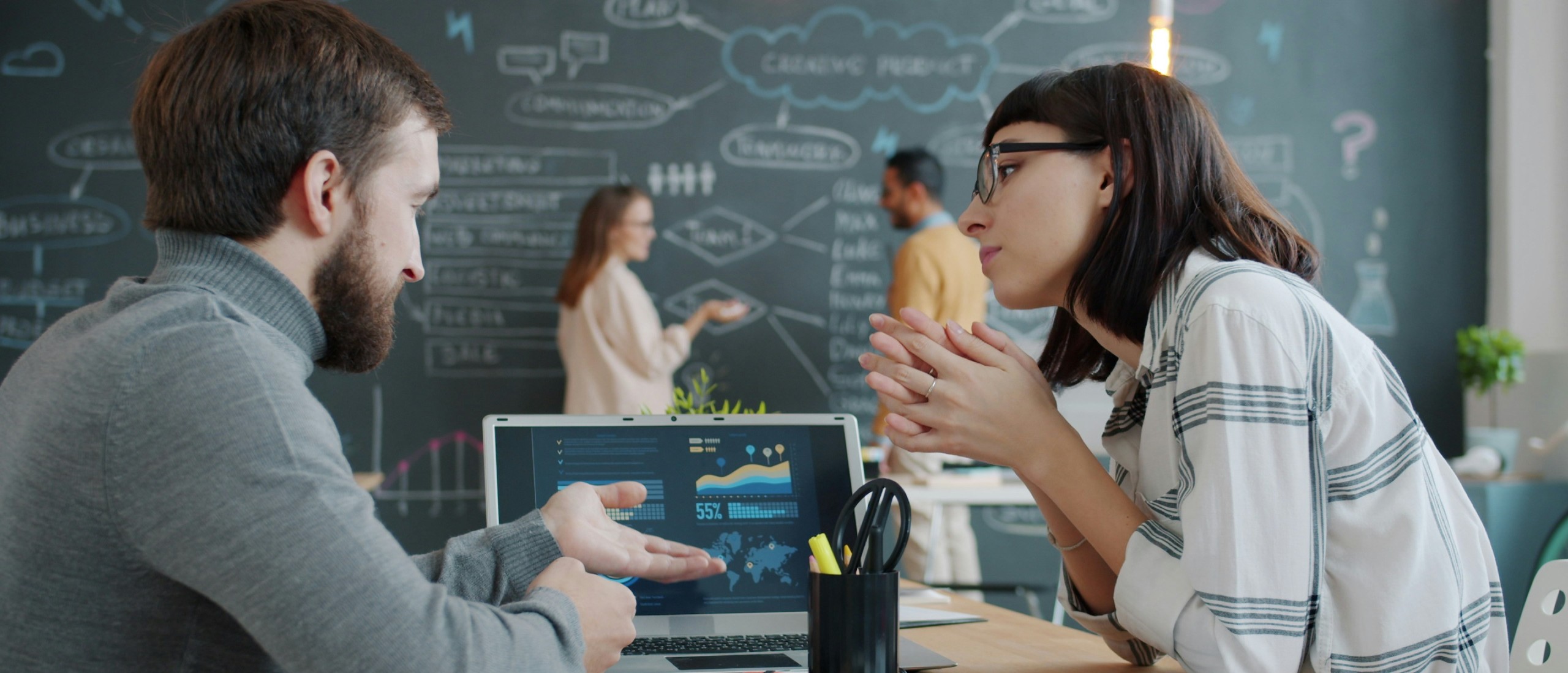 A client and a partner discuss data.