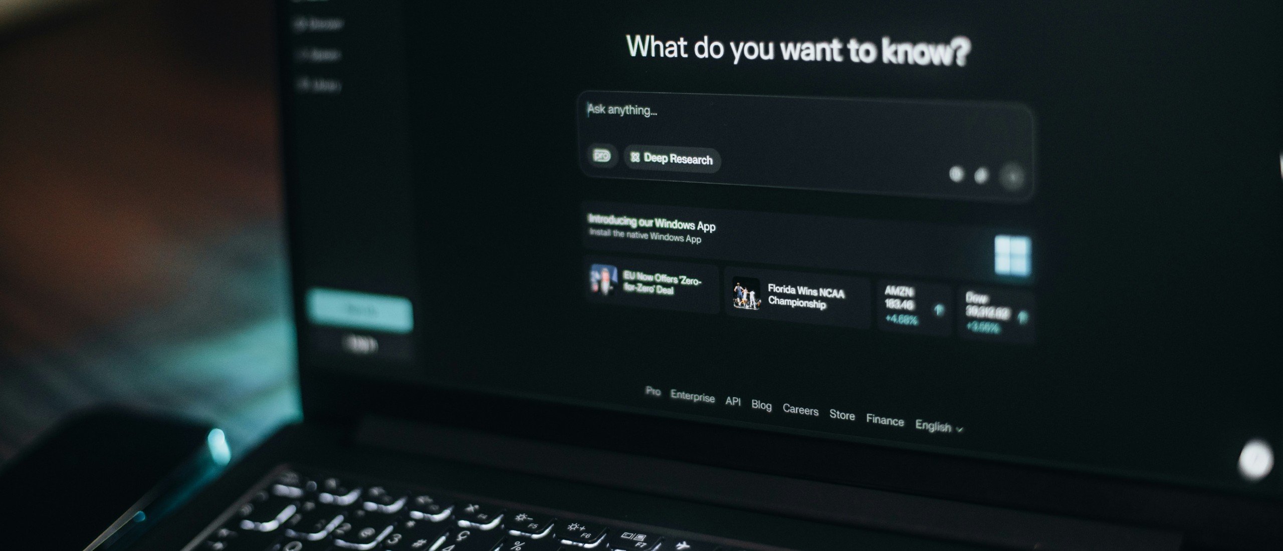 A monitor shows an answer engine prompt.
