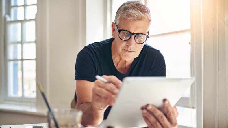 A designer goes over a website plan.